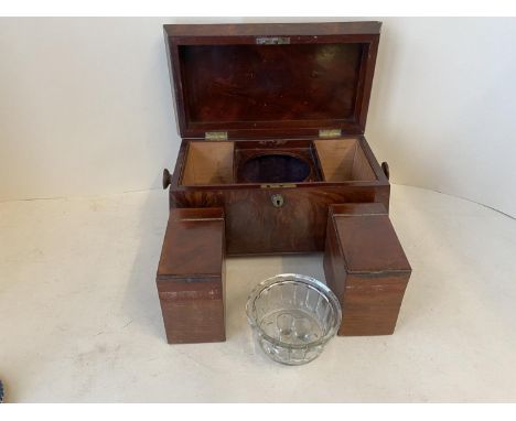 Early Regency mahogany tea caddy supported by bun feet 
