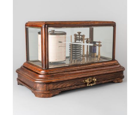 A LATE VICTORIAN OAK-CASED BAROGRAPHCirca 1895The lift-off top with bevelled glass panels, above the mechanism with eight ane