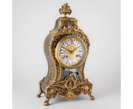 A FRENCH BOULLE MANTEL CLOCKCirca 1880Surmounted by a flower-filled urn, the case of waisted shape with 3 3/4in brass-cast di