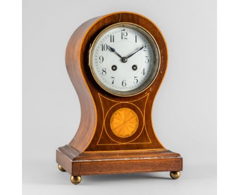 AN EDWARDIAN MAHOGANY, SATINWOOD AND BOXWOOD-OUTLINED BALLOON MANTEL CLOCKCirca 1900The case inlaid to the front with a round