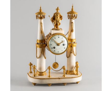 A LATE LOUIS XVI ORMOLU-MOUNTED MANTEL CLOCKBy Cronier A Paris, circa 1790Modelled as a pair of tapering columns, each with a