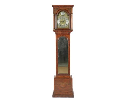 A GEORGE II WALNUT, BOXWOOD-OUTLINED AND ‘SUN-BURST’ INLAID MIRRORED-DOOR LONGCASE CLOCKBy Benjamin Davis, London, circa 1720
