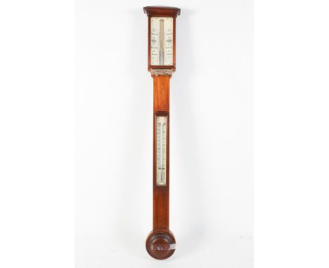 An early 20th century mahogany stick barometer. The stepped pediment over an ivory face, a ivory subsidiary thermometer benea