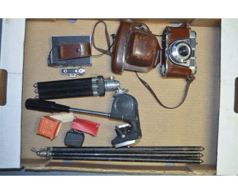 A Kodak Retinette 1B Camera, with 2 tripods and 2 rangefinders.