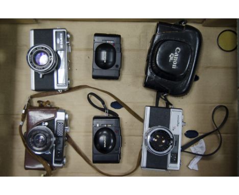 A Tray of Rangefinder Cameras, including a Olympus 35 LC, and auto eye, a Minolta 7s a Canon QL and Olympus XA and XA3 models
