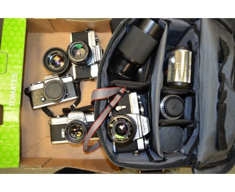 A Tray of Minolta SLR Cameras,  examples include, an XE-1, XD-7, SR-7, SRT202 with a qty of lenses; a MD rokkor 50mm f/1.4, M