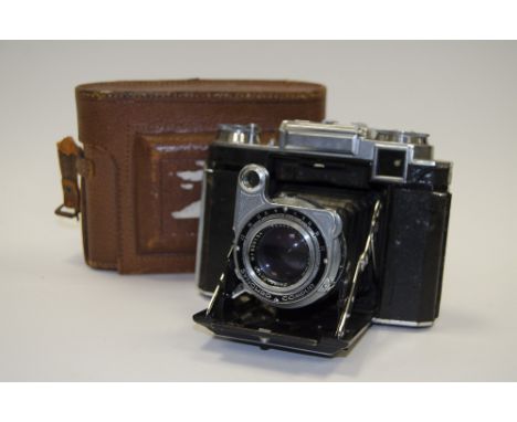 A Zeiss Ikon Super Ikonta 533/16 Folding Camera,  body F-G, some light damage to leatherette, shutter working with a Zeiss Op