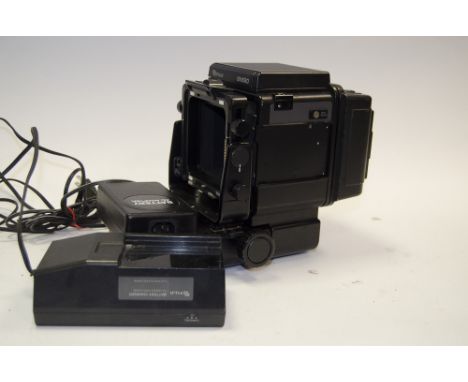 A Fuji Professional GX680 Camera Body, serial no. 6085001, 6x8 exposures on 120 revolving film back, untested, with battery c