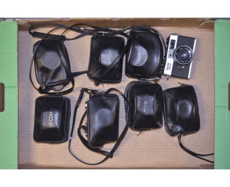 A Tray of Compact Rangefinder Cameras, various models by Ricoh and Minolta