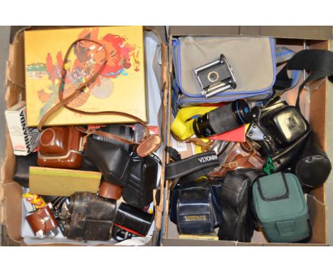 Two Trays of Cameras and Lenses, including a Eumig mini 5 cine camera in manufacturers box, SLRs including a Minolta 5000 SLR