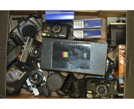 A Tray of Cameras, Parts and Accessories, including a Polaroid SLR 680 in presentation box, a Praktica MTL3 with two lenses, 