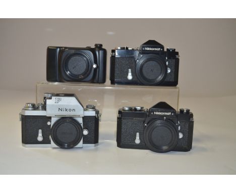 Nikon Camera Bodies,  Ftn serial no. 6745550, chrome, body F, some brassing and marks to chrome, and a pair of Nikkormat Ftn 