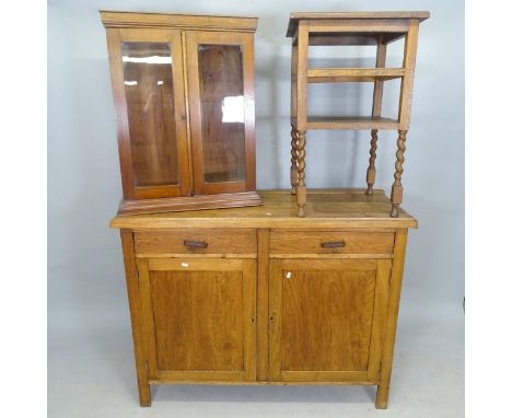 An early 20th century oak dresser base, with 2 fitted drawers and cupboards under, 121 x 94 x 50cm, a mahogany 2-door display