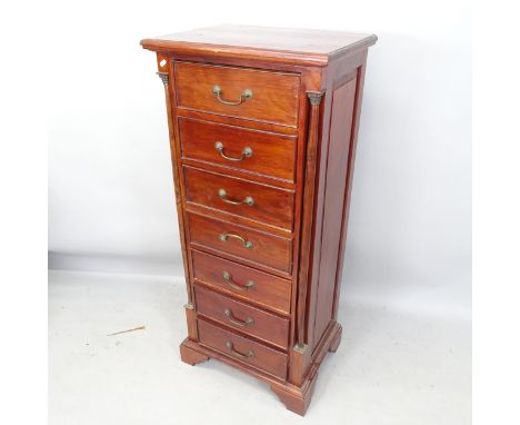 A reproduction mahogany chest of 7 drawers, with 2 turned pilasters, brass mounts, on bracket feet, 60cm x 137cm x 45cm 
