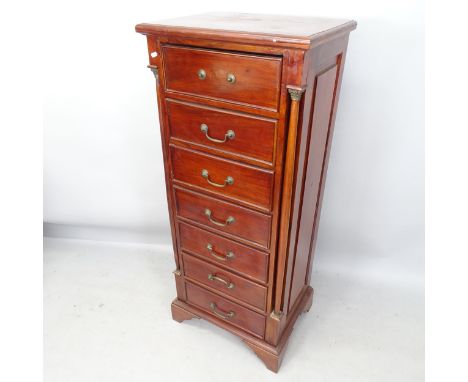 A reproduction mahogany chest of 7 drawers, with 2 turned pilasters, brass mounts, on bracket feet, 58cm x 139cm x 44cm 