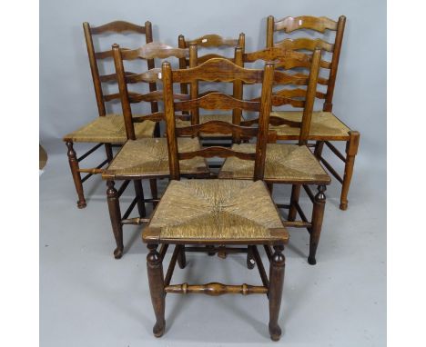 A harlequin set of 6 oak rush-seated ladder-back dining chairs 
