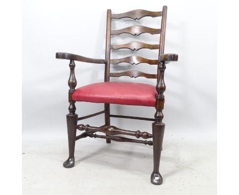 An Antique style ladder-back armchair, with red leather seat 