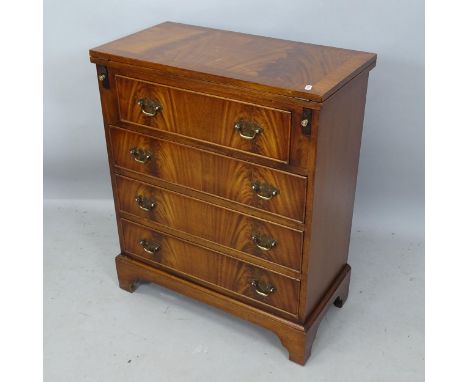 A crossbanded mahogany bachelor's chest of 4 drawers, with fold over top, on bracket feet, 62cm x 76cm x 34cm 