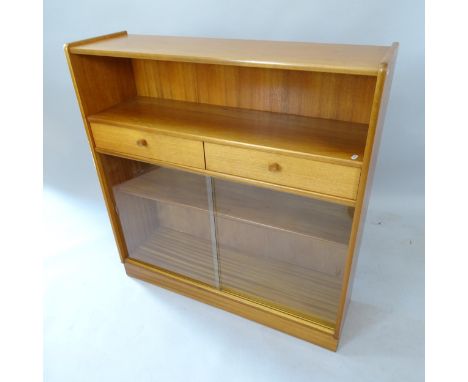 A contemporary light oak bookcase, by Nathan Furniture, with 2 fitted drawers and glass sliding doors, 102cm x 107cm x 31cm 