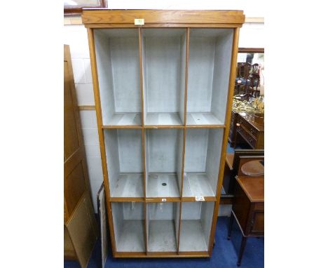 A SET OF LIGHT OAK OPEN SHELVES, with nine compartments (s.d.)