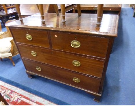 A 19TH CENTURY MAHOGANY CHEST OF TWO SHORT AND TWO LONG DRAWERS, with ogee bracket feet