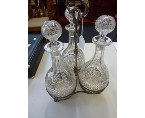 ELKINGTON & CO SILVER PLATED TRIPLE DECANTER FRAME, with three globe shafts decanters and stoppers