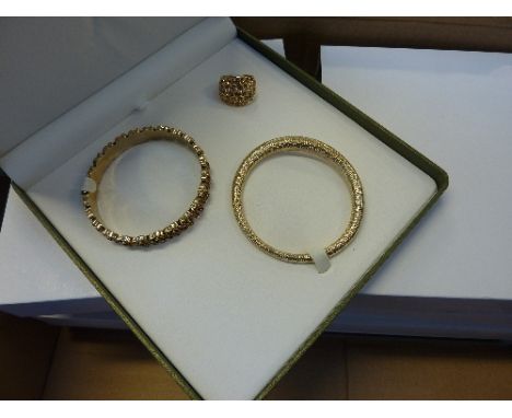 A COLLECTION OF COSTUME JEWELLERY SETS, to include a bangle, a ring and a further gemset bangle, each individually boxed (9)