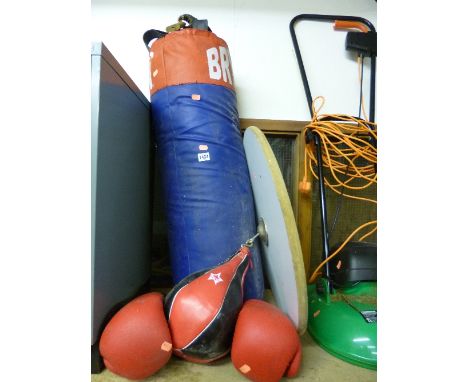 A QUANTITY OF GYM EQUIPMENT, including two punch bags, a gym bench and gloves (5)