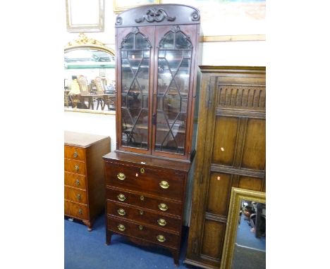 A 19TH CENTURY SECRETAIRE BOOKCASE, double astragal glazed doors above a deep fitted secretaire drawer, three further long dr