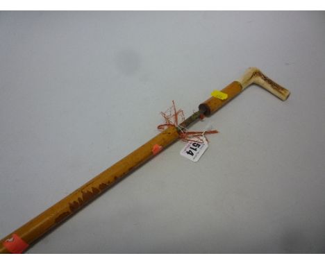 AN ANTIQUE SWORDSTICK, with cane sheath and bone handle (a/f)