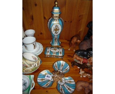 THREE PIECES OF LIMOGES PORCELAIN, blue and white stripped with gilt decoration, to include lidded vase, trinket box and nut 