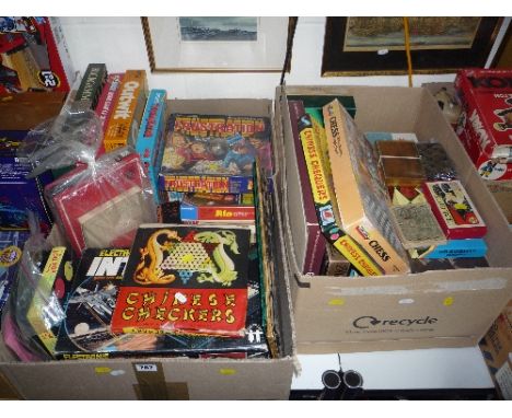 TWO BOXES OF GAMES, to include various chess and draughts sets, mastermind, scrabble, checkers etc (contents not checked)