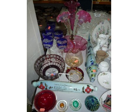 VARIOUS COLOURED GLASS, to include ruby coloured epergne (s.d.), Mdina paperweight, glass fish, rolling pin etc