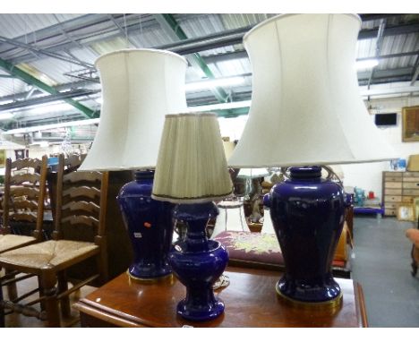 A PAIR OF LARGE BLUE BALUSTER CERAMIC TABLE LAMPS, with shades and another table lamp with shade (3)