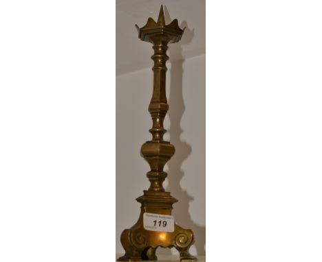 A Gothic gilt metal three-footed pricket stick, hexagonal sconce