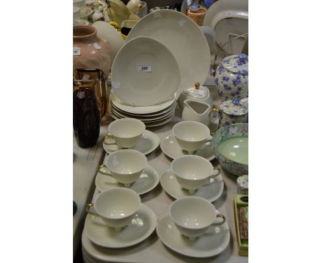 A Winterling Bavarian porcelain six-setting tea service, of futuristic design, comprising sandwich plate, triangular sucrier 