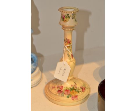 A Royal Worcester blush ivory candlestick, painted with pink, red and yellow flowers on a blush ivory ground, 20cm high, prin