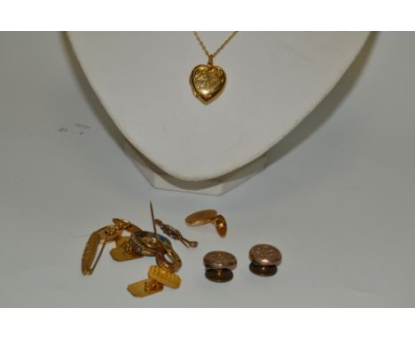 A 12ct rolled gold heart-shaped locket and chain, boxed; an Edwardian stick pin, 9ct gold twisted pin crested with a base met