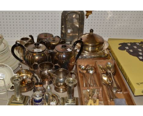 Silver Plate - an EPNS entrée dish and cover; an early 20th century four-piece tea service; another; a muffin dish and cover;