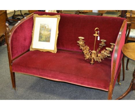 An Edwardian mahogany and boxwood strung two seat salon sofa, burgandy upholstery, tapered legs, fitted casters, c.1905