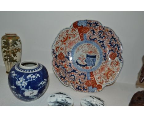 A set of four Chinese lidded circular cups, decorated in underglaze grey, ball finials 