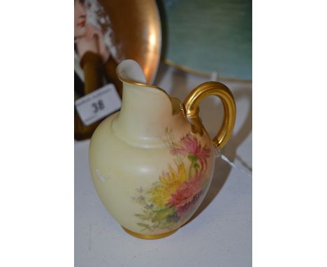 A Royal Worcester flat sided ovoid jug, printed and painted with spring flowers on a blush ivory ground, reeded gilt handle, 