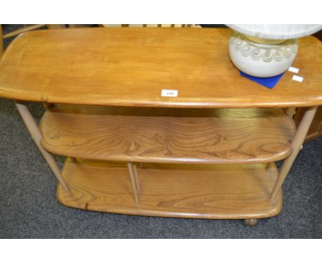 An Ercol retro elm  freestanding flying low open shelf /bookcase / room divider, 71cm high, 32cm deep, 92cm wide, c.1960