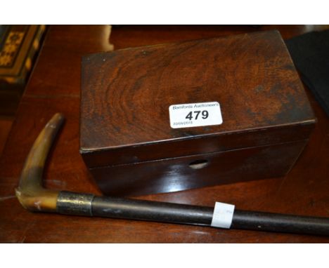 A Victorian mahogany rectangular tea caddy, c. 1870; a late Victorian silver and horn walking stick, ebonised shaft (2)