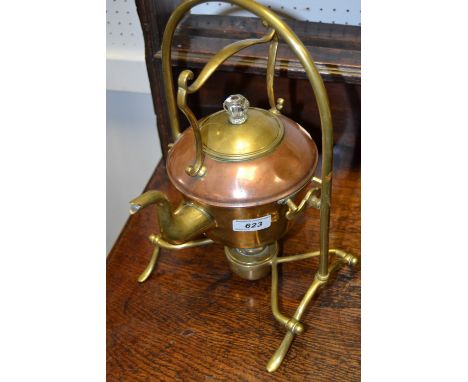 A Victorian copper and brass spirit kettle on stand , arch top frame, shaped handle c.1880 