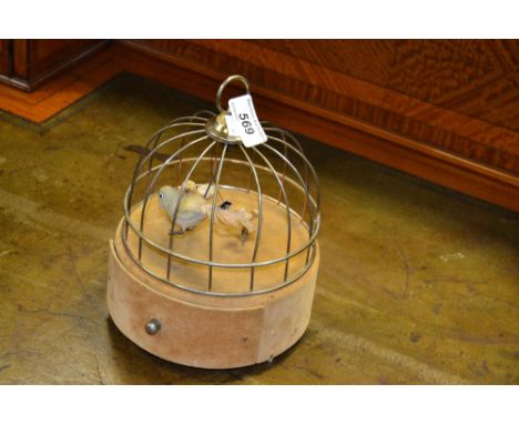 A mid 20th century automaton singing bird in cage jewellery cabinet, drawer to base, c.1940