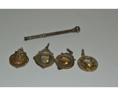 A Victorian silver propelling pencil, capped with a paste amethyst, Chester 1899; a Victorian silver Albert fob; others, 23.8