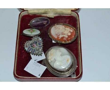 A Blue John and white metal oval brooch; an Edwardian silver and guilloché enamel oval brooch, with a central spray of cabbag