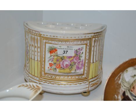 A Coalport demi-lune bough pot, painted with a gilt panel of colourful summer flowers in a basket, with gilt line and stiff l