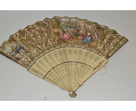 A 19th century French paper and bone twenty two stick fan, painted with young ladies and their suitors playing chess, flanked